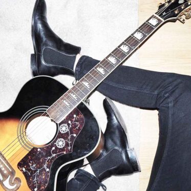 Carla black leather Chelsea boots for women