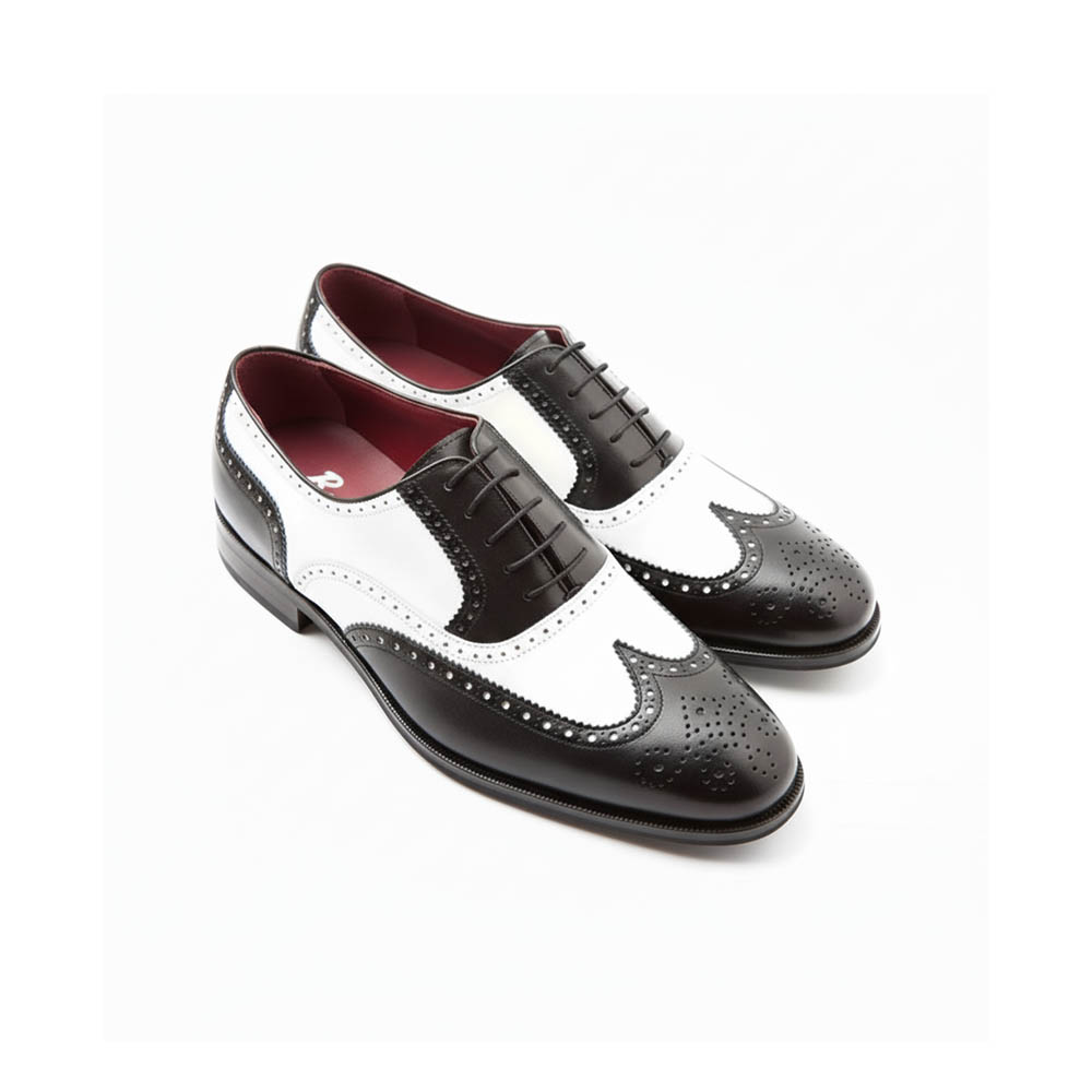 Zapato Oxford de cordones bicolor blanco y negro de hombre en piel de becerro hecho a mano en España por Beatnik Shoes