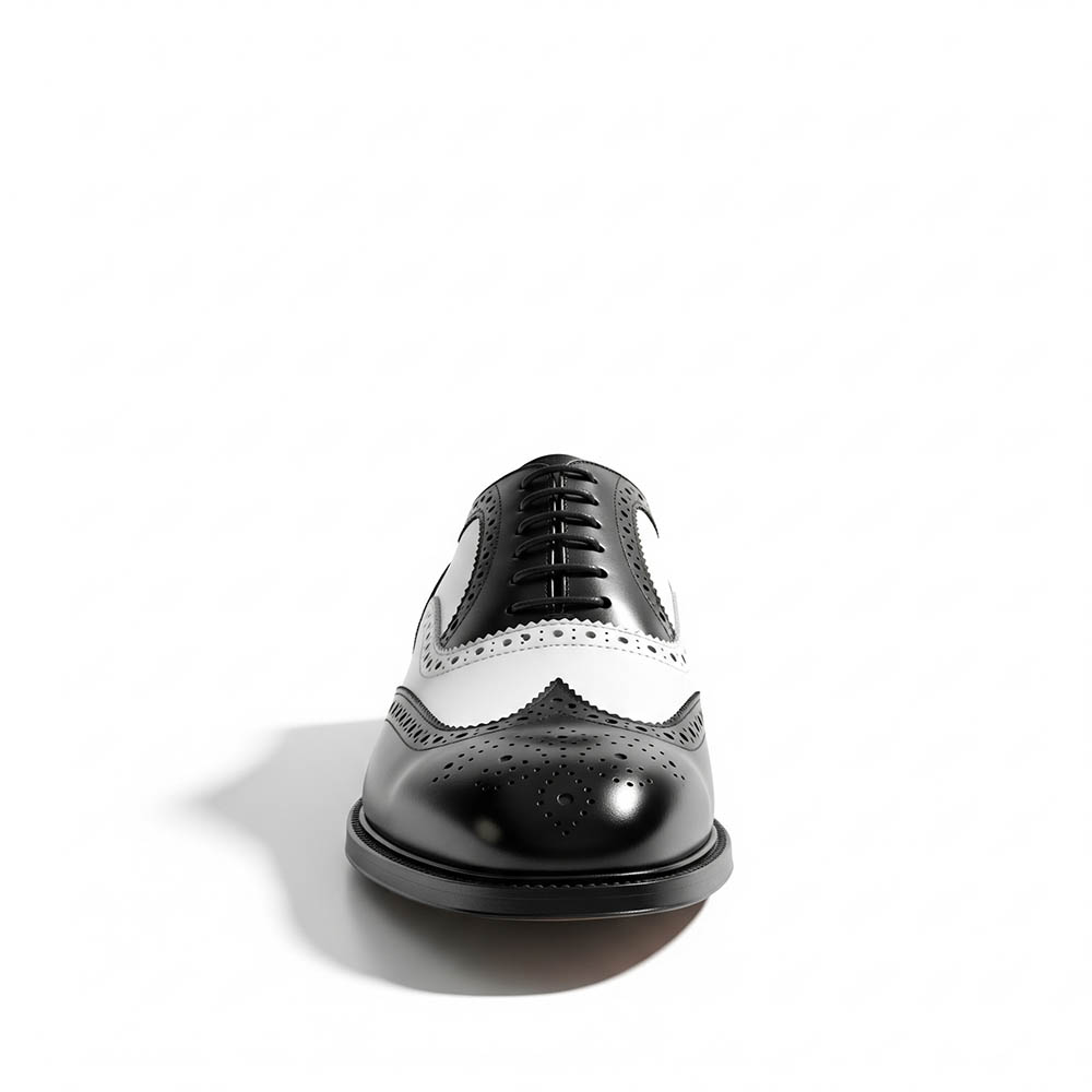 Zapato Oxford de cordones bicolor blanco y negro de hombre en piel de becerro hecho a mano en España por Beatnik Shoes